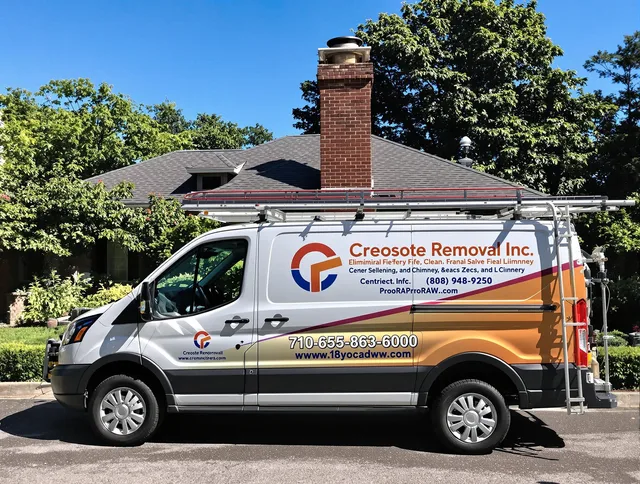 Windham Chimney Sweep technician removing creosote safely in Windham, CT